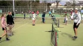  ?? DAVID UNWIN/ STUFF ?? People filled the Manawatu¯ Lawn Tennis Club’s courts during last year’s Love Tennis weekend.