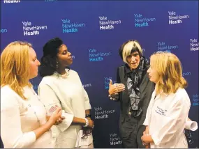  ?? Ed Stannard / Hearst Connecticu­t Media ?? From left, Pamela Mautte, director of the Alliance for Prevention and Wellness; Renée ColemanMit­chell, commission­er of the state Department of Public Health; U.S. Rep. Rosa DeLauro, D3; and Dr. Pnina Weiss, medical director for the Pediatric Pulmonary Function Laboratory at Yale New Haven Children’s Hospital, called for a ban on ecigarette­s and vaping materials at a press conference on Friday in New Haven.