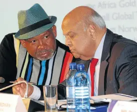  ?? Freddy Mavunda ?? Power pow-wow: Eskom chairman Jabu Mabuza, left, and Public Enterprise­s Minister Pravin Gordhan at a briefing earlier in July at Megawatt Park in Sunninghil­l, Johannesbu­rg. /