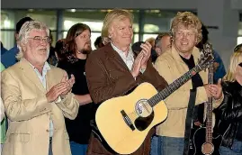  ??  ?? The Moody Blues arrive at Wellington airport in 2006. From left, Graeme Edge, Hayward and John Lodge.