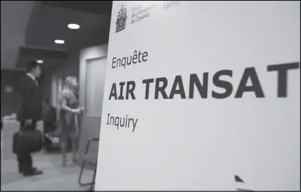  ?? CP PHOTO ?? The door to the hearing room is opened for the afternoon session of a Canadian Transporta­tion Agency hearing into Air Transat in Ottawa. Ground crews working two Air Transat flights that faced high-profile tarmac delays this summer say the pilots...