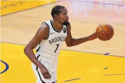  ?? ASSOCIATED PRESS ?? Brooklyn’s Kevin Durant is going to miss some time with the Nets this week due to a hamstring injury, but the team hopes Durant could return for a Thursday showdown with the Lakers in Los Angeles.