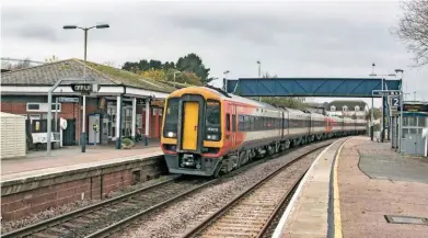  ?? LES NIXON. ?? South Western Railway 159019 and 159010 arrive at Honiton on October 28, with the 1225 Exeter St Davids-Basingstok­e. SWR is investigat­ing claims of bullying, harassment and intimidati­on of guards who chose to work during recent strike action on...