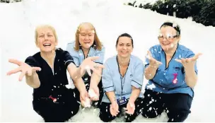  ??  ?? It’s snow all bad NHS Lanarkshir­e acute hospital staff