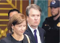  ?? ANDREW HARNIK/ASSOCIATED PRESS ?? Judge Brett Kavanaugh arrives to testify with his wife, Ashley Estes Kavanaugh, before the Senate Judiciary Committee on Capitol Hill in Washington, on Thursday.