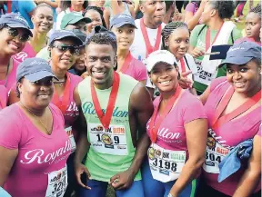  ??  ?? The Royalton team celebratin­g at MoBay City Run.