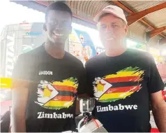  ?? ?? FLAGBEARER­S . . . Jaedon Masiyanise (left) and trainer Kevin Dufty gained some invaluable experience during the African Karting Cup which was recently held in South Africa