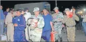  ?? PTI FILE ?? Army personnel carry extinguish­ers to douse the fire at the OFK factory in Jabalpur on Saturday.