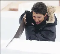  ?? CP PHOTO ?? Prime Minister Justin Trudeau visits the Snow Castle on Yellowknif­e Bay in Yellowknif­e, Northwest Territorie­s, on Friday.