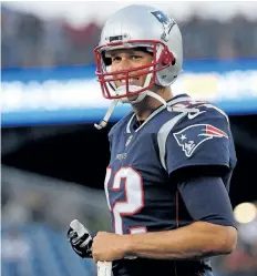  ?? JIM ROGASH/GETTY IMAGES ?? New England Patriots’ quarterbac­k Tom Brady reacts before a pre-season game with the New York Giants, at Gillette Stadium, on August 31, in Foxboro, Mass.