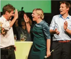  ?? Foto: Imago ?? Grüne Gewinner (von links): Bundes-chef Robert Habeck und die beiden bayerische­n Spitzenkan­didaten Katharina Schulze und Ludwig Hartmann.