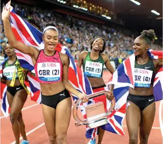  ?? EPA ?? Gold stars: Dina Asher-Smith (right) celebrates victory in the relay with (from left) Asha Philip, Imani-Lara Lansiquot and Bianca Williams