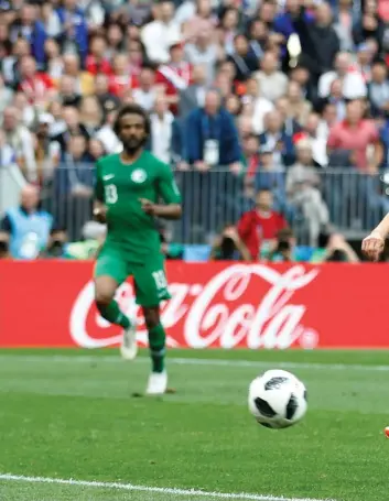  ?? (Photos: Reuters) ?? RUSSIA’S DENIS Cheryshev scores their second goal in the the Russia vs Saudi Arabia World Cup match on June 14 in Moscow’s Luzhniki Stadium.