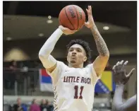  ?? (Democrat-Gazette file photo) ?? Junior guard Jaizec Lottie, who averaged 6.4 points per game this season for UALR, has entered the transfer portal and will not return for the Trojans next season.