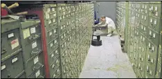  ?? CONTRIBUTE­D BY KINO LORBER ?? The last remaining archivist, Jeff Roth, searches The New York Times morgue.