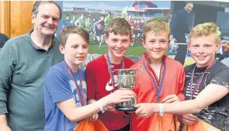  ??  ?? Winning feeling Members of the 7th East Kilbride Boys’Brigade won the junior hike event