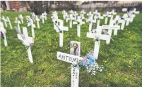 ?? RICHARD LAUTENS TORONTO STAR FILE PHOTO ?? Crosses were placed on the lawn at Mississaug­a’s Camilla Care Community nursing home in May in memory of some of the 68 residents who died during a COVID-19 outbreak. Ontario’s data was not included in StatsCan excess deaths report.