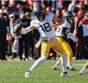  ?? David K Purdy/Getty Images ?? Rice transfer quarterbac­k J.T. Daniels has played against Texas in Austin for West Virginia and USC.