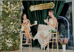  ?? (The New York Times/Vincent Tullo) ?? Laura Kim, a creative director of Oscar de la Renta, and James Whiteside, a principal dancer with the American Ballet Theatre, talk on stage Aug. 12 at the start of a weekend-long salon they hosted in New York.