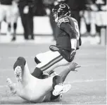  ?? ARMANDO L. SANCHEZ/CHICAGO TRIBUNE ?? Vita Vea sacks Bears quarterbac­k Nick Foles in October at Soldier Field in Chicago.