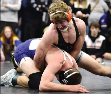  ?? BRENT W. NEW — BOCOPREPS.COM ?? Erie’s Carson Hageman wrestles Fort Collins’ Beckett Cropp on Dec. 15in Greeley. Hageman qualified through last weekend’s regionals for the upcoming Class 4A state tournament at Ball Arena in Denver.