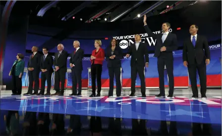  ?? ERIC GAY — THE ASSOCIATED PRESS ?? From left, Democratic presidenti­al candidates Sen. Amy Klobuchar, D-Minn., Sen. Cory Booker, D-N.J., South Bend Mayor Pete Buttigieg, Sen. Bernie Sanders, I-Vt., former Vice President Joe Biden, Sen. Elizabeth Warren, D-Mass., Sen. Kamala Harris, D-Calif., entreprene­ur Andrew Yang, former Texas Rep. Beto O’Rourke and former Housing Secretary Julian Castro are introduced for the Democratic presidenti­al primary debate hosted by ABC on the campus of Texas Southern University Thursday in Houston.