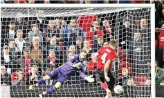  ??  ?? Phil Jones missed the crucial spot-kick as Derby eliminated Manchester United from the League Cup on penalties. - AFP photo