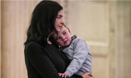  ?? Photograph: Liam McBurney/PA ?? Dáithí Mac Gabhann and his mother, Seph Ni Mheallain, at Stormont.