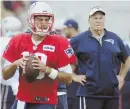  ?? AP PHOTO ?? ON THE WHISTLE: Under the gaze of coach Bill Belichick, Pats backup quarterbac­k Jimmy Garoppolo runs a drill in practice yesterday in White Sulphur Springs, W.Va.