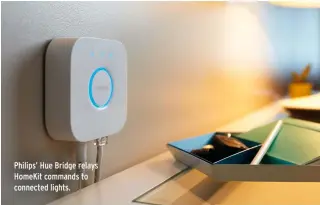  ??  ?? Philips’ Hue Bridge relays HomeKit commands to connected lights.