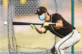  ?? K.C. ALFRED U-T ?? Padres pitcher Yu Darvish works on his bunting during a recent spring practice.