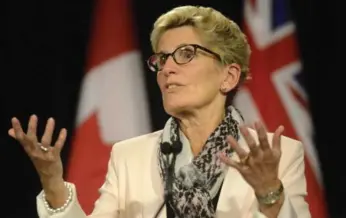  ?? MARTA IWANEK/THE CANADIAN PRESS ?? Premier Kathleen Wynne says $2.5 million for teachers unions has not actually been handed over yet.