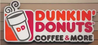  ?? GENE J. PUSKAR/AP ?? The Dunkin’ Donuts name change will take place in January.