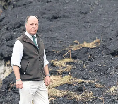  ?? Picture: Gareth Jennings. ?? Estate factor Malcolm Taylor surveys the scorched land yesterday.