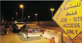  ??  ?? Abdul Rahman/ Gulf News Vehicles are parked illegally at a prohibited area in Musaffah, Abu Dhabi. The municipali­ty had closed roads in the area as part of constructi­on of new parking facilities.