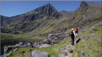  ?? Stock Image ?? Hikers make their way up Carrauntoo­hil.