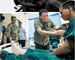  ??  ?? President Duterte confers the Order of Lapu-Lapu with the Rank of Kampilan to one of the wounded soldiers he visited at Camp Teodulfo Bautista Station Hospital in Jolo, Sulu the other day.