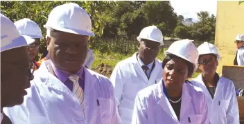  ??  ?? Chief Justice Luke Malaba (left) tours the new Mutare High Court building accompanie­d by Judicial Service Commission secretary, Justice Rita Makarau