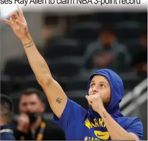  ?? TNS ?? Golden State Warriors guard Stephen Curry points to the basket from the 3-point line before a game against the Indiana Pacers on Dec. 3 at Gainbridge Fieldhouse in Indianapol­is.