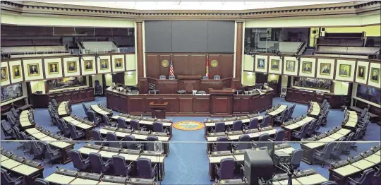  ?? STEVE CANNON / ASSOCIATED PRESS ?? The Florida House chambers sit empty in April during the contentiou­s regular session, which ground into a budget impasse. The House adjourned three days early.