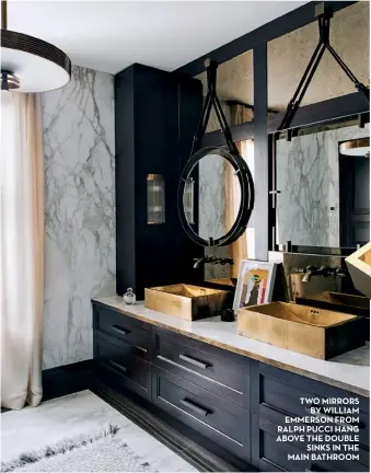  ??  ?? two mirrors by william emmerson from ralph pucci hang above the double sinks in the main bathroom