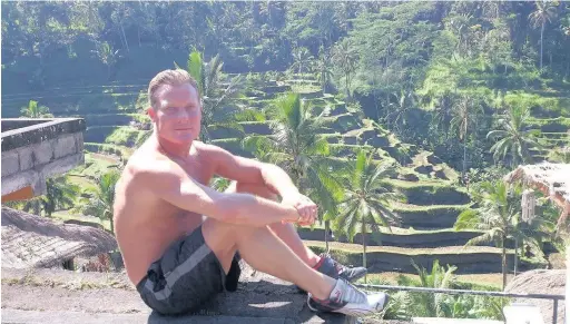  ??  ?? ●●Andrew Rowson pictured in Bali before he was injured
