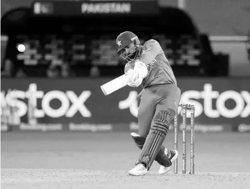  ?? AP ?? Pakistan’s Asif Ali plays a shot during the ICC Men’s T20 World Cup match against Afghanista­n in Dubai, United Arab Emirates yesterday.