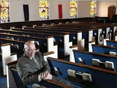  ?? Associated Press ?? ■ The Rev. Alvin J. Gwynn Sr., of Friendship Baptist Church in Baltimore, sits in his church’s sanctuary. He bucked the cancellati­on trend by holding services last Sunday. But attendance was down by about 50%, and Gwynn said the day’s offering netted about $5,000 compared to a normal intake of about $15,000. “It cuts into our ministry,” he said. “If this keeps up, we can’t fund all our outreach to help other people.”