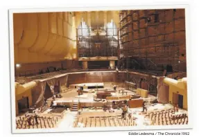  ?? Eddie Ledesma / The Chronicle 1992 ?? Top: Beth Murray, managing director of the cityowned theaters that make up San Francisco’s Performing Arts Center — Davies Symphony Hall, the War Memorial Opera House, Herbst Theatre and Zellerbach Rehearsal Hall, has a view of the Opera House from her desk. Above: The seat supports dot Davies Hall during the remodeling Murray oversaw in 1992.