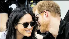  ?? DPA-BILD: LAWSON ?? Der britische Prinz Harry und die US-Schauspiel­erin Meghan Markle in Toronto (Kanada)