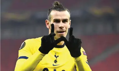  ??  ?? Gareth Bale celebrates his goal for Tottenham in their Europa League first leg against Wolfsberge­r. Photograph: Tamás Kovács/EPA