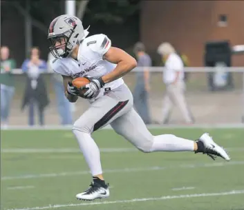  ?? Carnegie Mellon Athletics ?? Carnegie Miellon University senior receiver John Prather tied a school record with 10 catches in a 45-15 win a week ago at Bethany. He also scored a career-high four touchdowns.