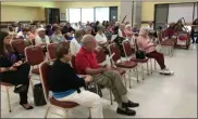  ?? MICHAEL GWIZDALA - MEDIANEWS GROUP ?? Seniors listen and ask question at a town hall at the Cohoes Senior Center.