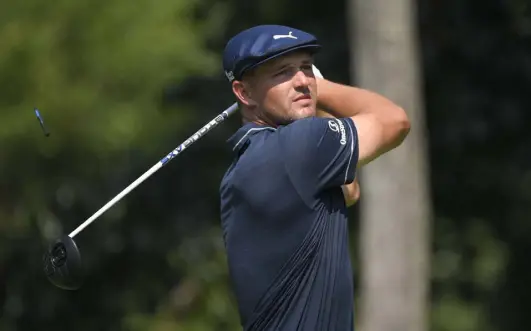  ?? Nick Wass, The Associated Press ?? Bryson Dechambeau tees off on the second hole during the second round of the BMW Championsh­ip on Friday at Caves Valley Golf Club in Owings Mills, Md.